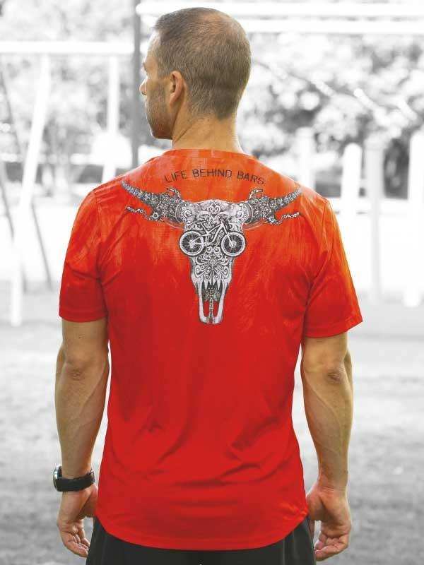Men's red cycling jersey with bull skull and bike graphic, 'Life Behind Bars' text, outdoor wear