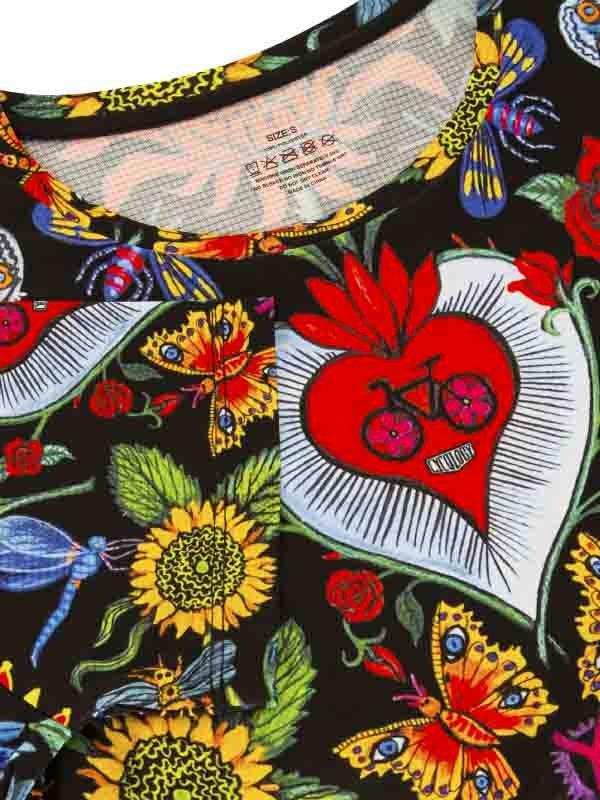 Vibrant floral and butterfly print cycling jersey with red heart and bike design, size S