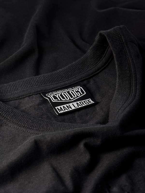 Black men's cycling t-shirt with Cycology brand tag, size large, soft fabric detail