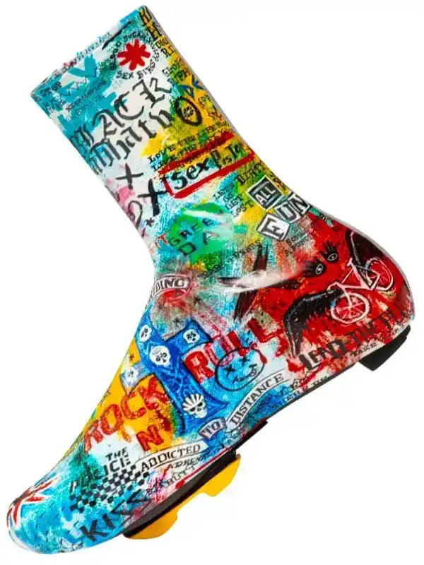 Colorful graffiti-style cycling shoe cover with bold graphics and text, designed for road bike riders.