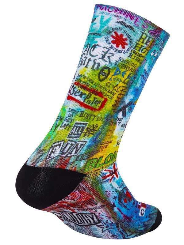 Colorful cycling sock with graffiti-style graphics, black toe and heel, ideal for road or mountain biking