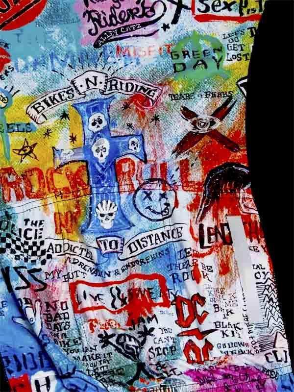 Vibrant rock-themed cycling jersey with graffiti art, skulls, and band names for men and women riders.