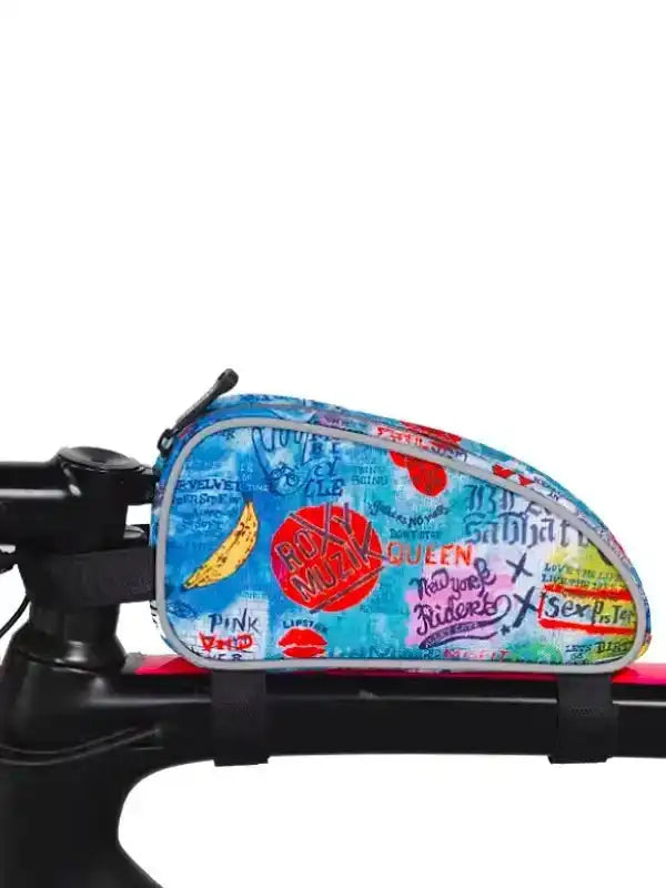 Colorful graffiti-style cycling frame bag with bold prints, attached to bike top tube for storage