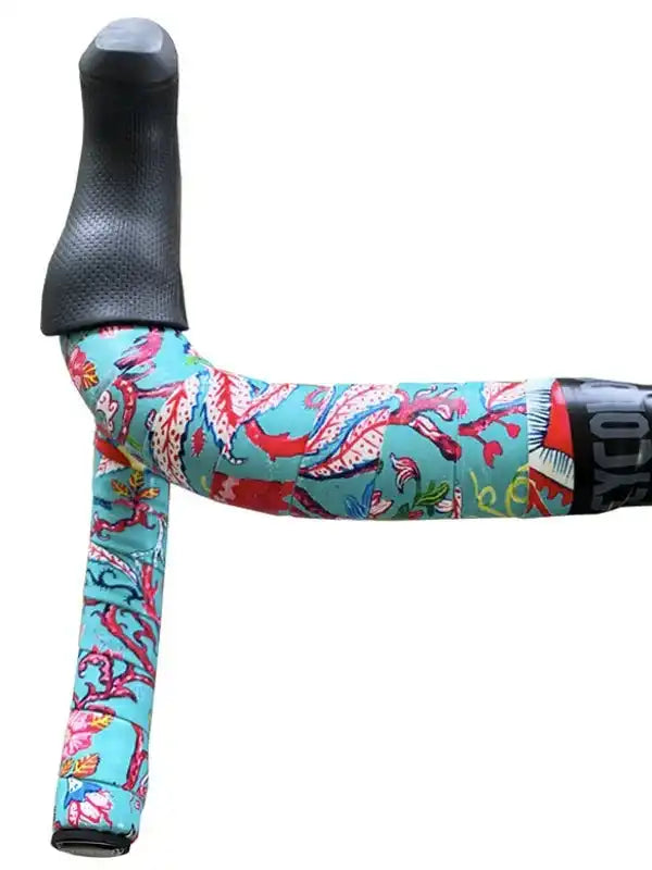 Colorful floral cycling handlebar tape with ergonomic grip, perfect for road bikes and bike accessories.