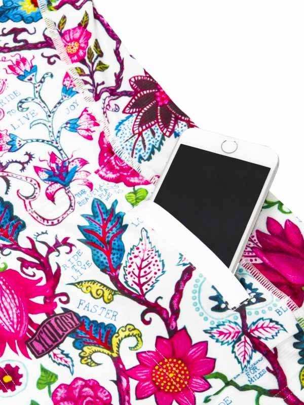 Women's cycling shorts with vibrant floral print and phone pocket, ideal for rides