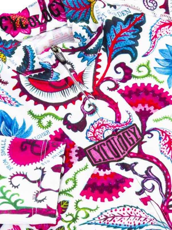 Vibrant floral and gear pattern cycling jersey with zipper detail, featuring bold pink, blue, and green designs.