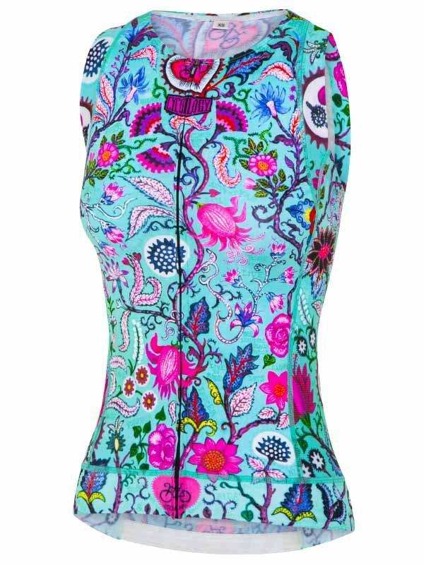 Women's sleeveless cycling jersey with vibrant floral and paisley print on turquoise background