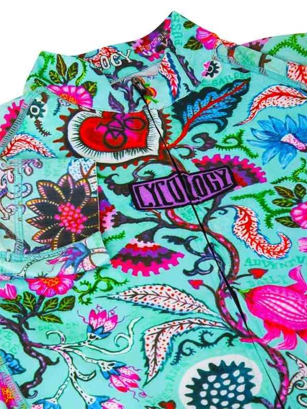 Vibrant floral cycling jersey with bold patterns and zipper detail for men and women