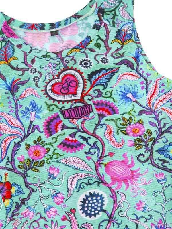 Vibrant floral cycling jersey with heart and bike design, colorful patterned women's bike wear