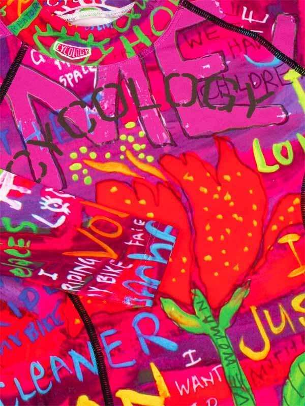 Vibrant pink cycling jersey with bold graffiti-style graphics, red tulips, and colorful text designs
