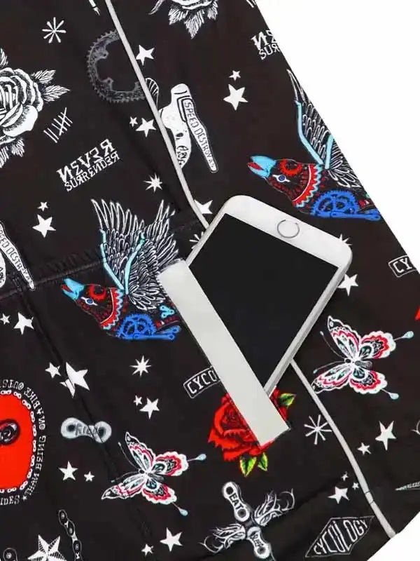 Black cycling shorts with colorful bird, butterfly, and star print, featuring phone pocket for on-the-go convenience.