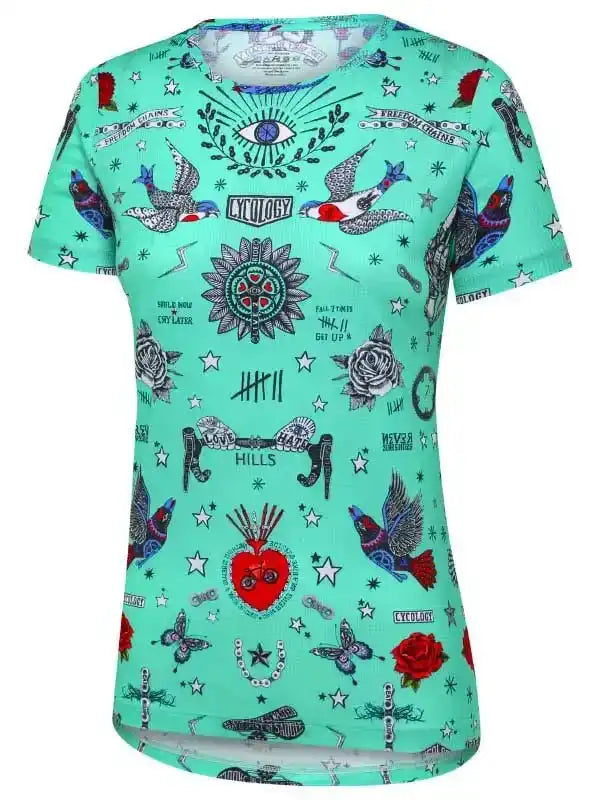 Women's mint green cycling jersey with tattoo-style birds, roses, stars, and eye design for road biking