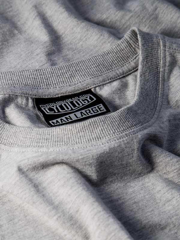 Grey men's cycling t-shirt with Cycology brand tag, size large, soft fabric detail