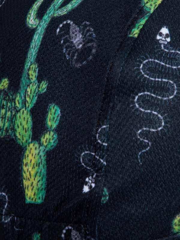 Black cycling jersey with green cactus and skull snake print design