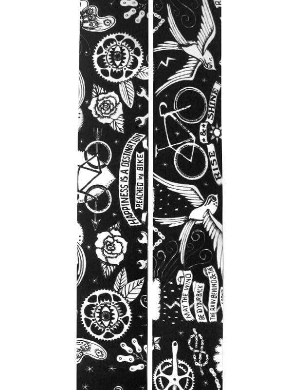 Black and white cycling-themed fabric with bikes, roses, birds, and motivational phrases for cycling apparel