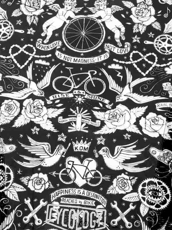 Black and white cycling-themed fabric with roses, bikes, and motivational quotes for men's and women's apparel