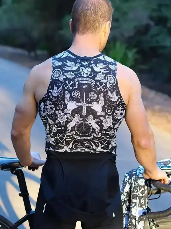 Men's cycling jersey with unique black and white tattoo-style design, worn on a bike ride outdoors